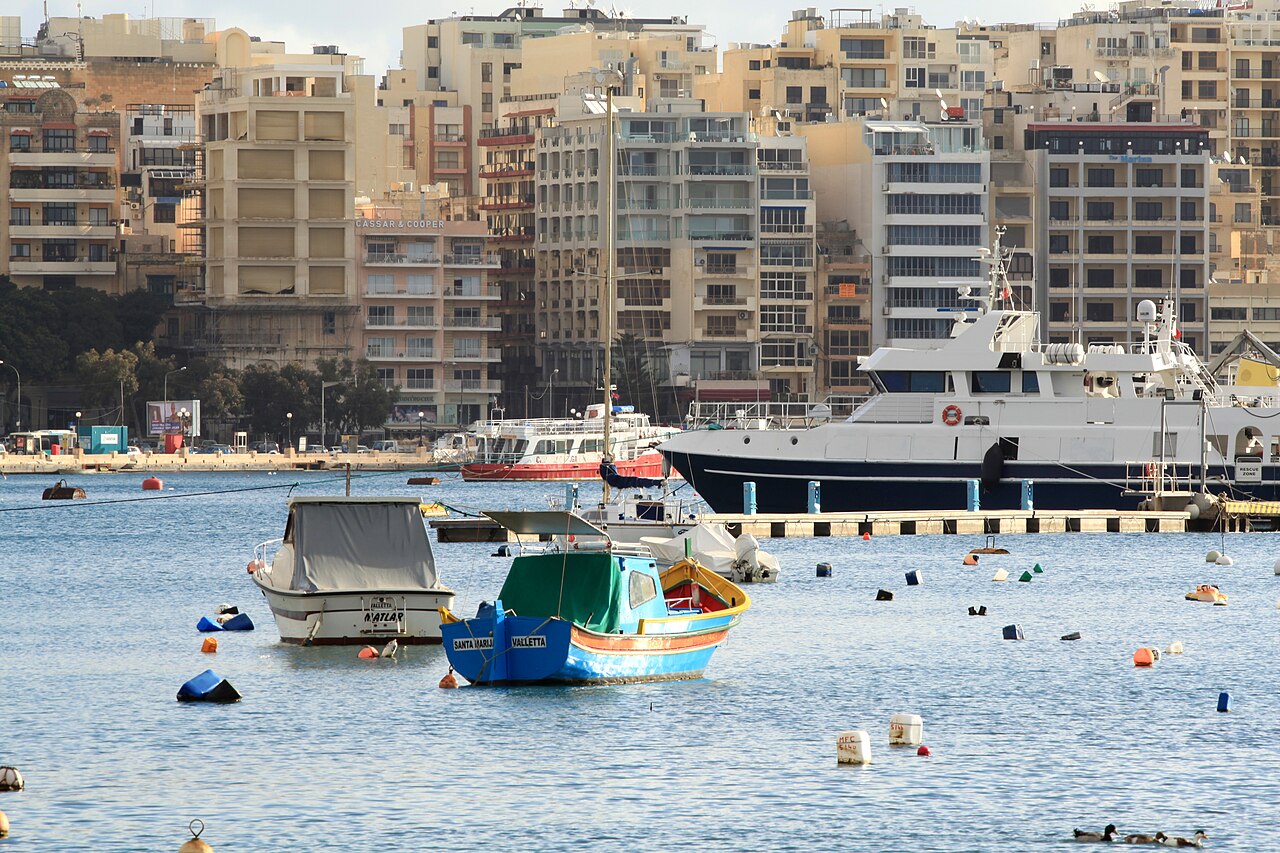 Moored boats in Sliema Creek with Sliema buildings behind