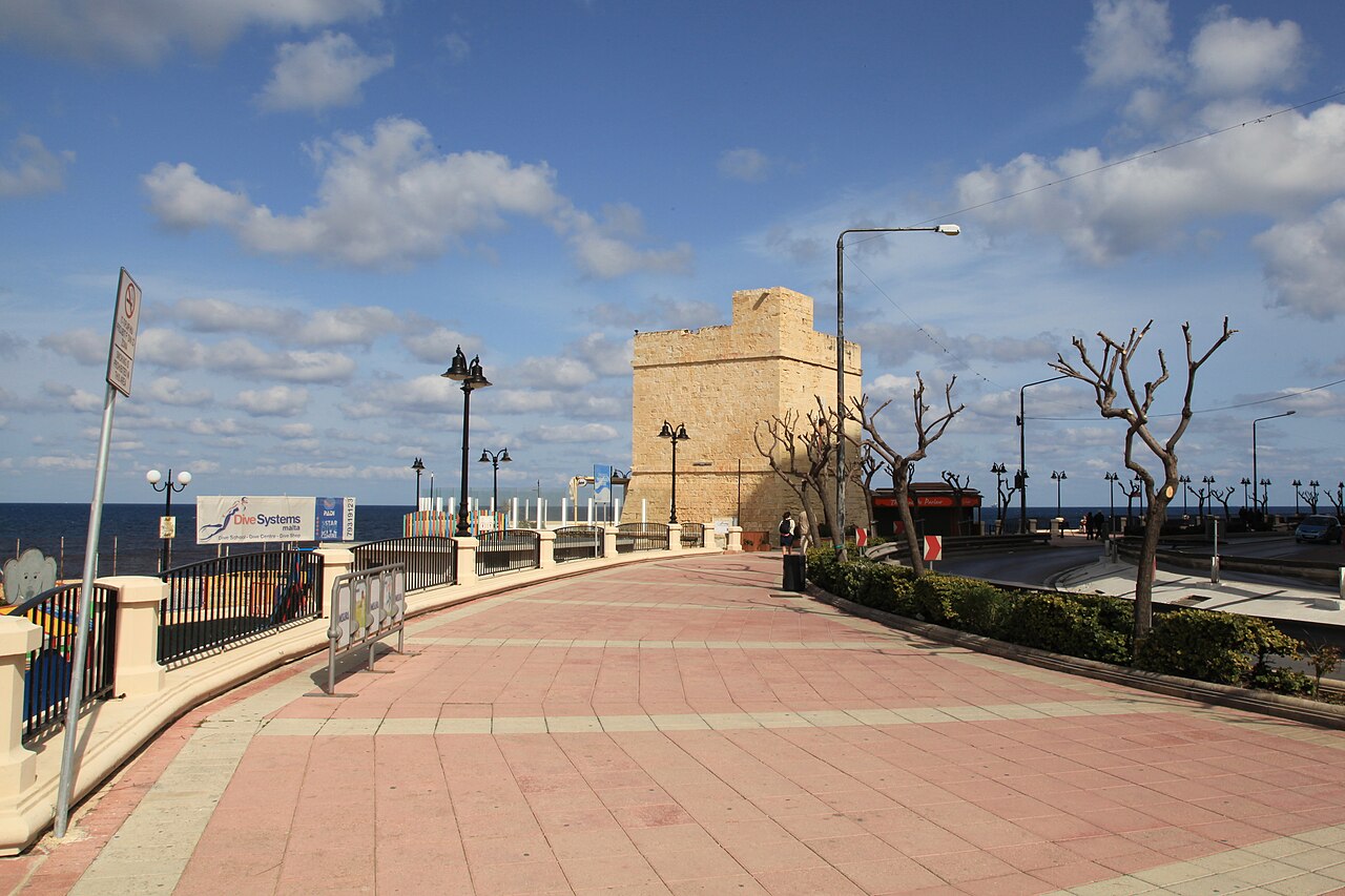 Wide promenade leading to St Julian's Tower on the Sliema seafront