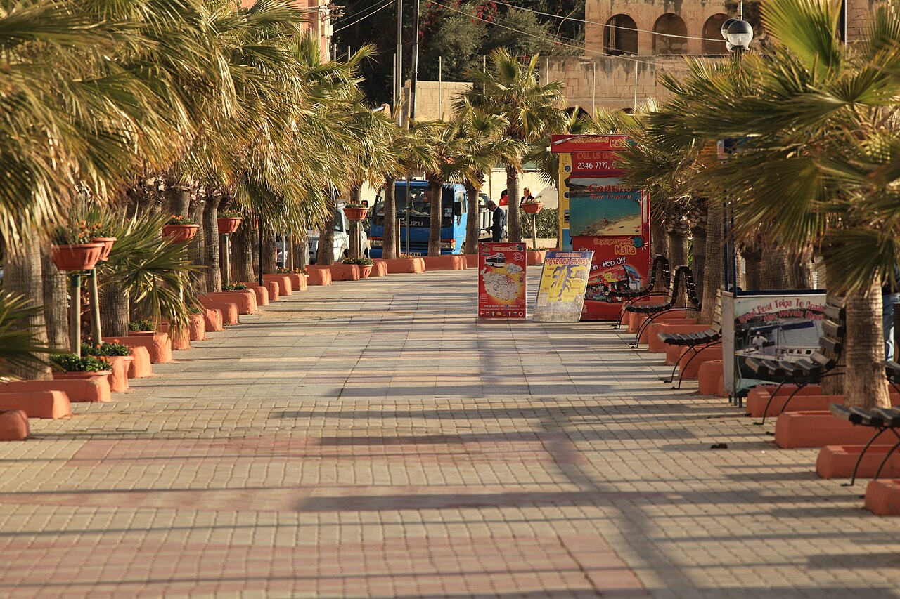 Palm-lined promenade along The Strand in Sliema