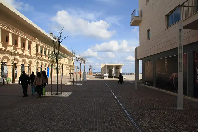 Pjazza Tigné in front of The Point shopping mall with restored barracks arcades